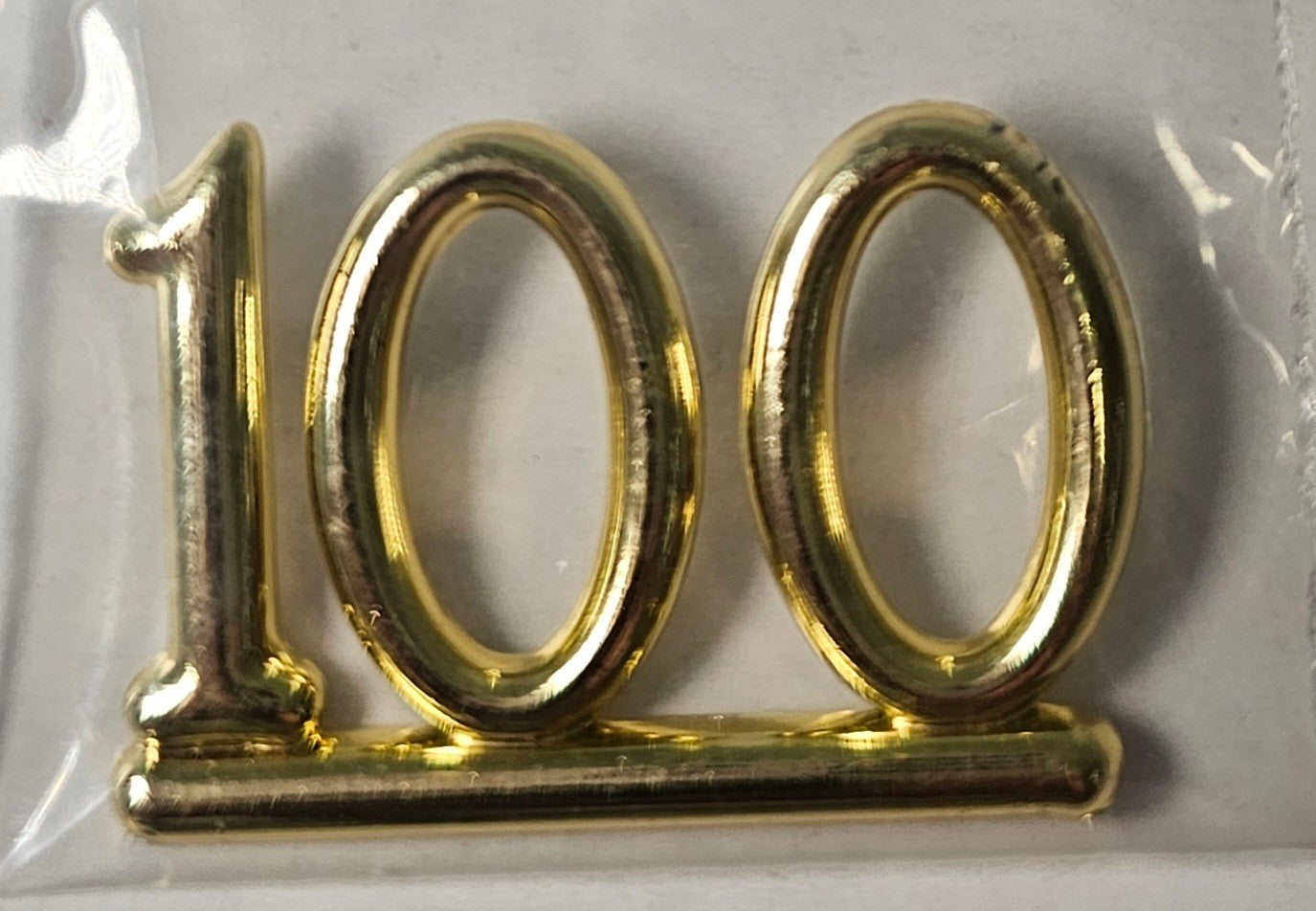 Gold 100 Embellishment 1"